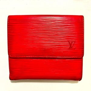 Authentic Louis Vuitton red wallet.